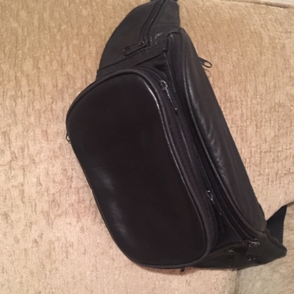 Black leather fanny pack, sling bag or travel bag